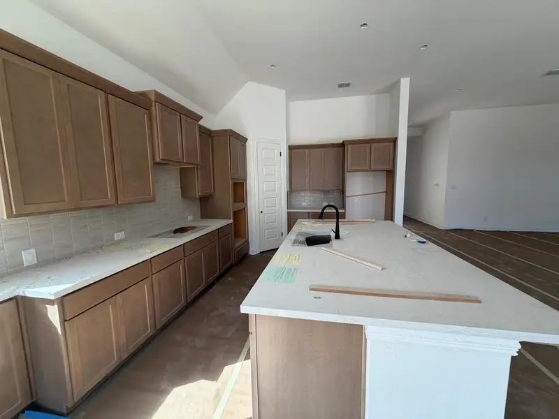 In-progress construction of a new home in Hawkes Landing, Leander, TX (Image 7).