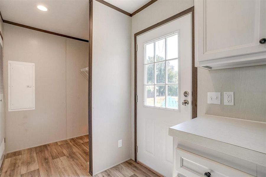 View of back door and utility room