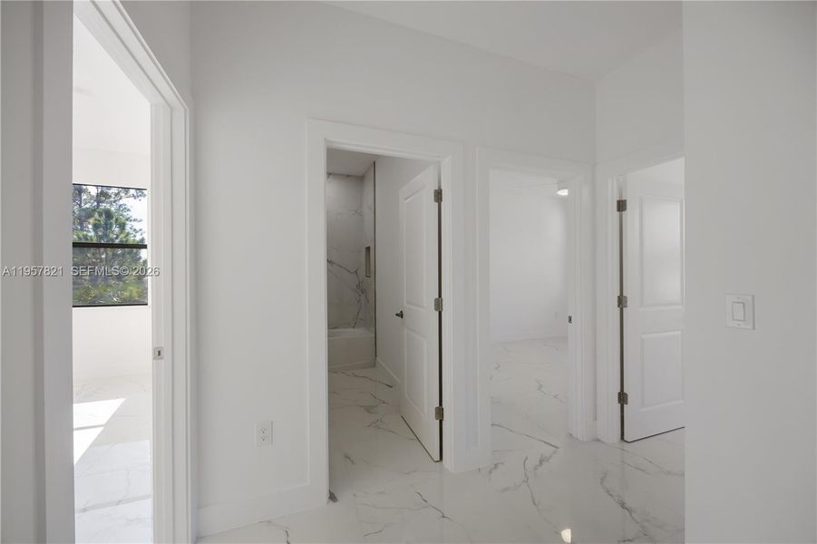 Entry landing to the other bedrooms and 2nd bathrooms