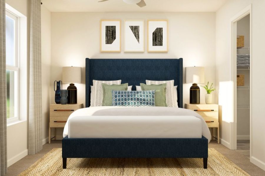 A bedroom with a bed and a desk.