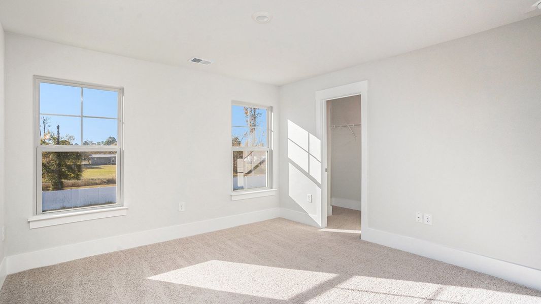 Spacious, unfurnished interior of a new home in Coastal Farms, Conway (Image 22).