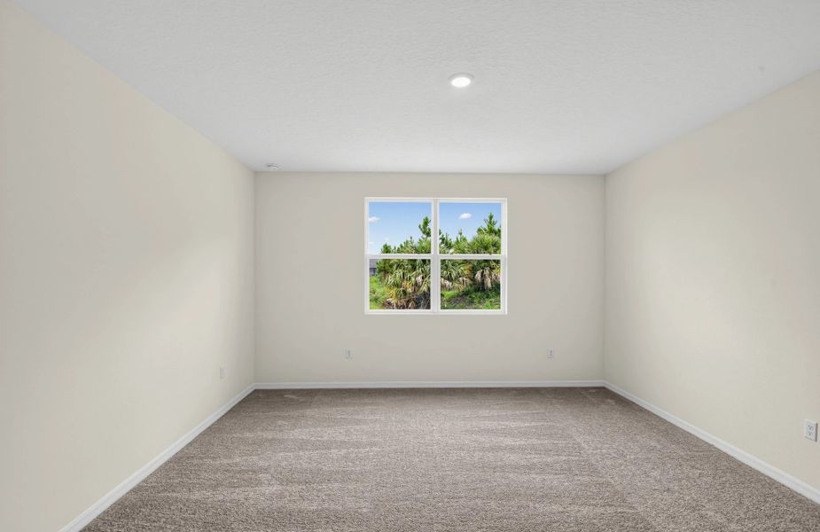 Spacious, unfurnished interior of a new home in Ardisia Park, New Smyrna Beach (Image 21).
