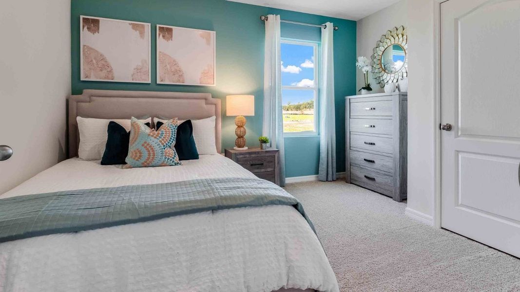 Representative furnished interior of a home built from the Robie by D.R. Horton in Kindred, Kissimmee (Image 11).