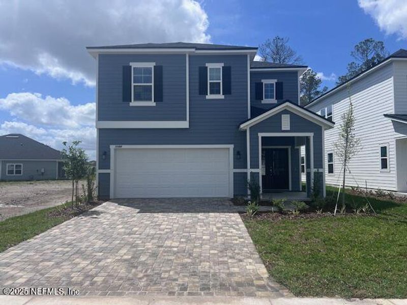 Exterior details and patio area of a home in Brook Forest - Single Family Homes, St. Augustine (Image 1).
