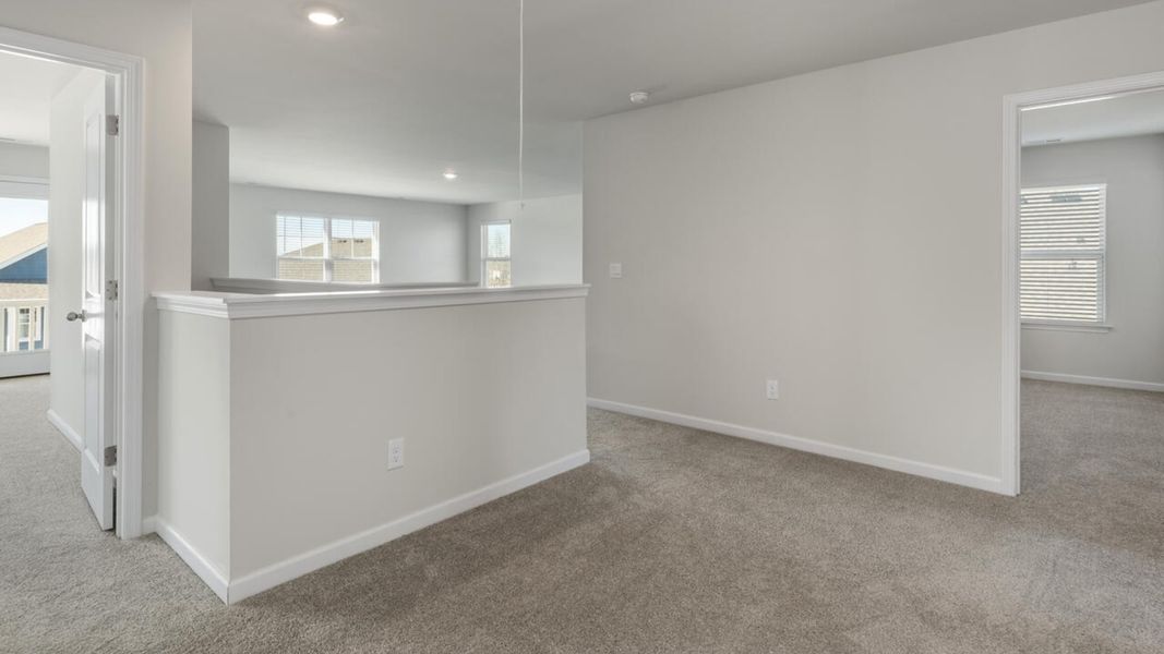 Representative unfurnished interior of a home built from the TILLMAN by D.R. Horton in Surfside Landing, Hubert (Image 36).