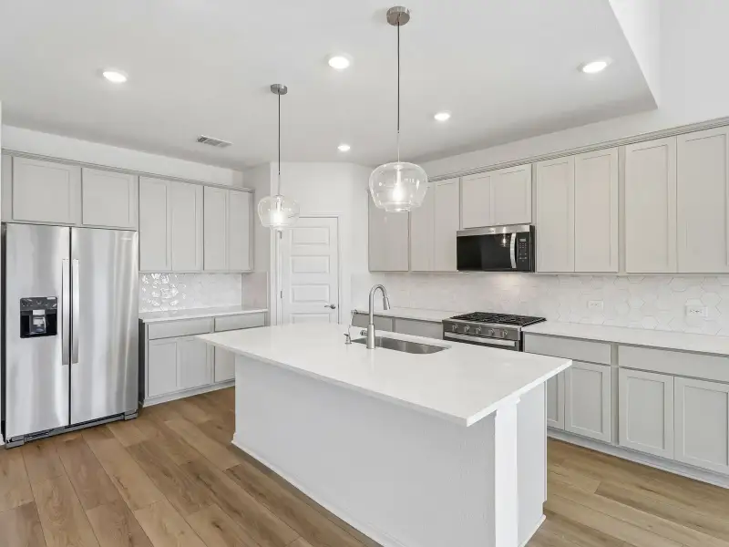 Furnished interior view inside a new home in Colony at Cole Springs - Boulevard Collection, Buda (Image 5).