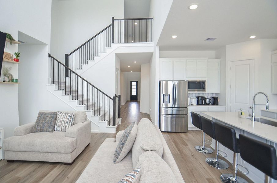 Imagine stepping into a bright airy space where the kitchen, dining and living areas flow seamlessly together