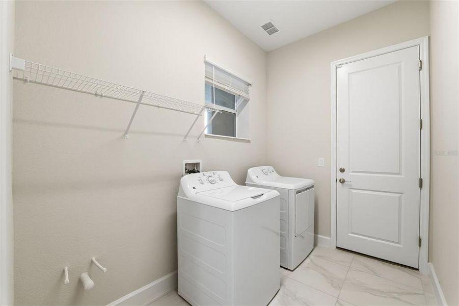 Furnished interior view inside a new home in Valencia Ridge, Wesley Chapel (Image 12).