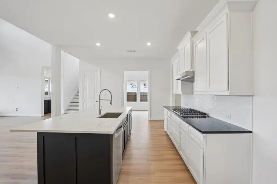 Furnished interior view inside a new home in Del Bello Lakes 60', Manvel (Image 8).