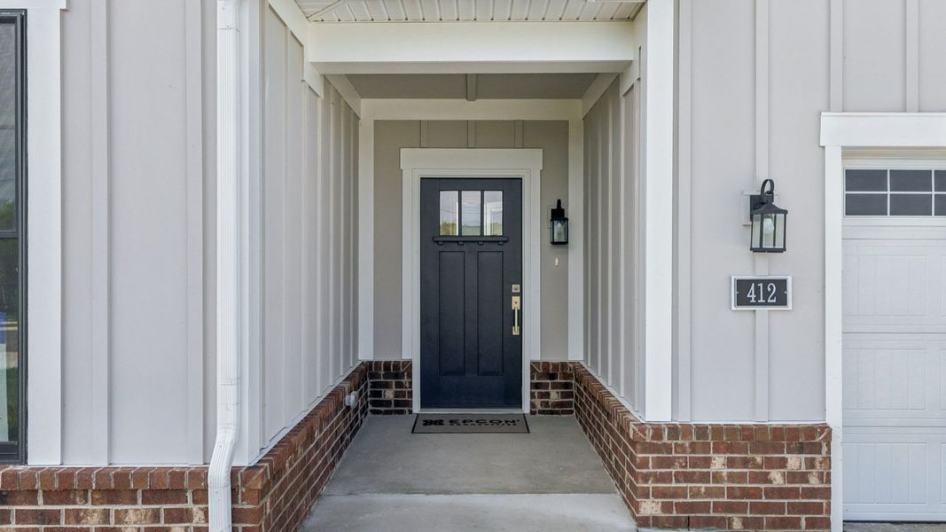 Exterior details and patio area of a home in The Courtyards at Stewarts Creek, Smyrna (Image 2).