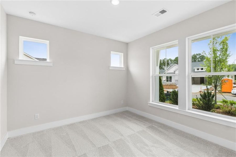 Spacious, unfurnished interior of a new home in Maple Grove at Towne Lake, Woodstock (Image 14). Spacious, unfurnished interior of a new home in Maple Grove at Towne Lake, Woodstock (Image 14).