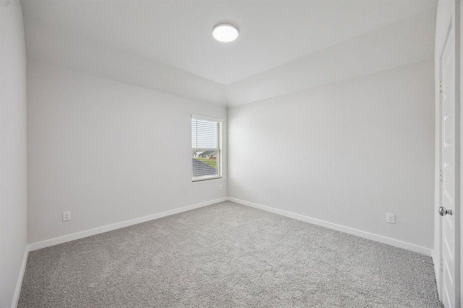 Bedroom in the Masters home plan by Trophy Signature Homes – REPRESENTATIVE PHOTO