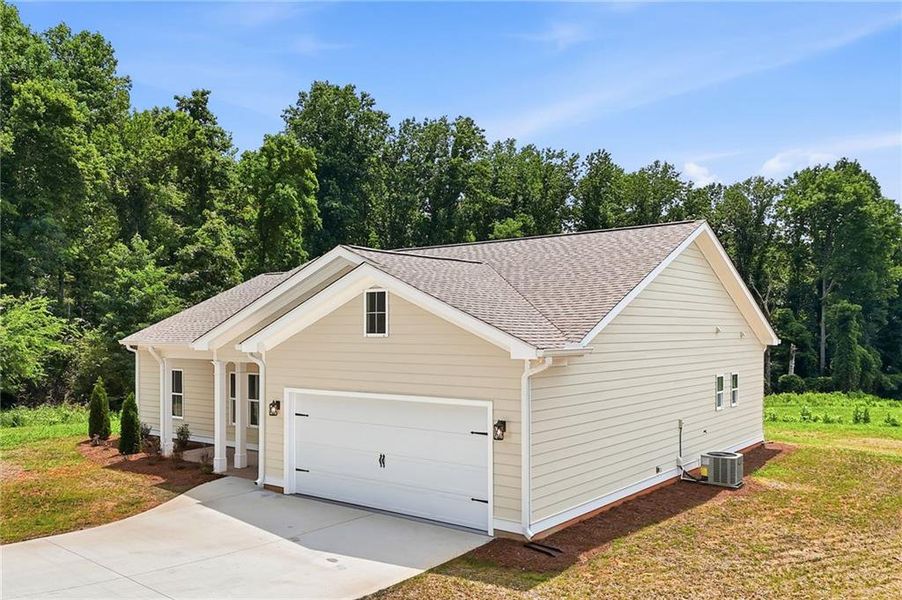 Front exterior of a new home in , Jasper, GA, highlighting curb appeal (Image 20).