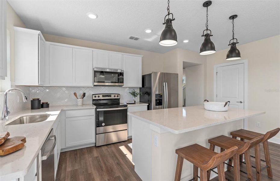 Furnished interior view inside a new home in Tohoqua, Kissimmee (Image 11).