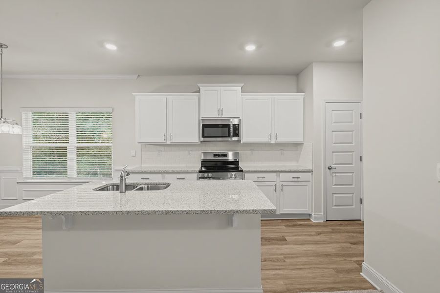 Furnished interior view inside a new home in Canterbury Villas, Carrollton (Image 5).