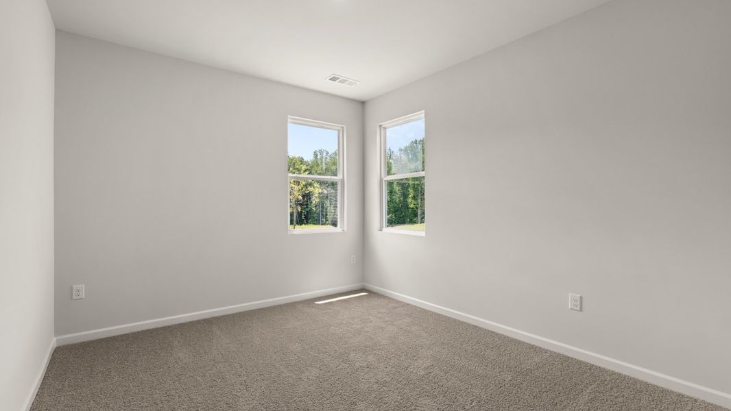 Representative unfurnished interior of a home built from the Mansfield by D.R. Horton in Liberty Crossing, Braselton (Image 29).
