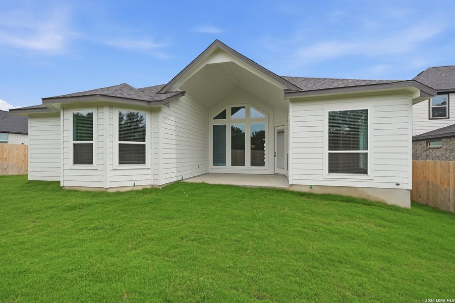 Exterior details and patio area of a home in The Reserve at Potranco Oaks, Castroville (Image 4).
