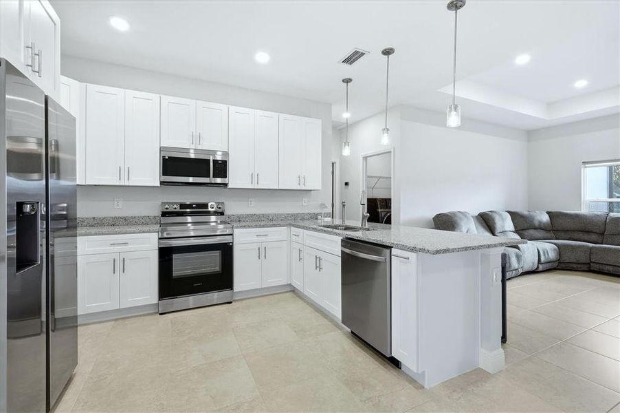 Furnished interior view inside a new home in , North Port (Image 8).