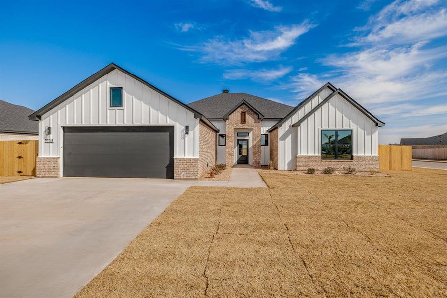 Front exterior of a new home in , Abilene, TX, highlighting curb appeal (Image 1). Front exterior of a new home in , Abilene, TX, highlighting curb appeal (Image 1).