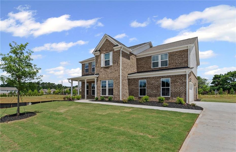 Front exterior of a new home in Anderson Point Estates, McDonough, GA, highlighting curb appeal (Image 18).