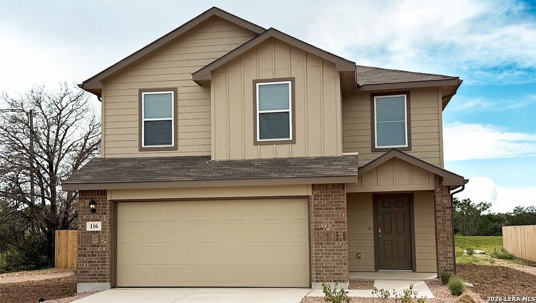 Front exterior of a new home in High Garden, Comfort, TX, highlighting curb appeal (Image 2).