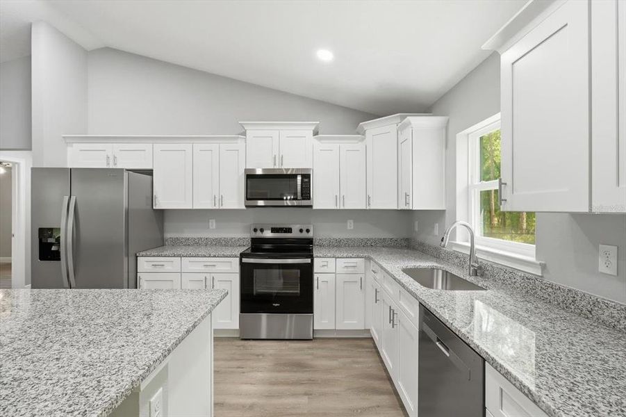 Furnished interior view inside a new home in , Dunnellon (Image 8).