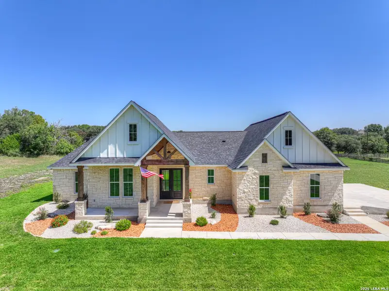 Front exterior of a new home in , Seguin, TX, highlighting curb appeal (Image 32).