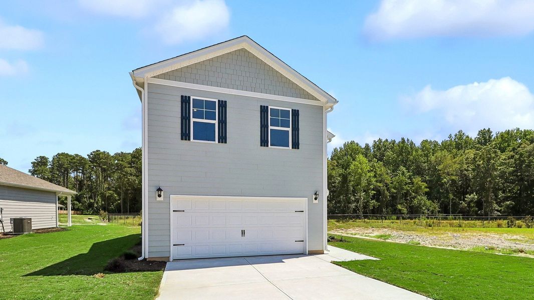 Front exterior of a new home in Sease's Pond, Gilbert, SC, highlighting curb appeal (Image 18).