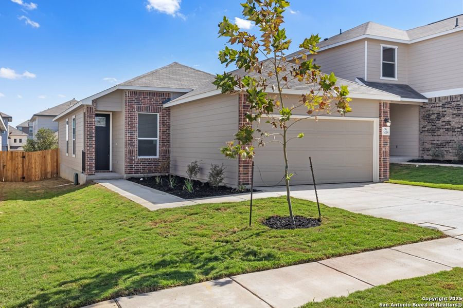Exterior details and patio area of a home in Knox Ridge, Converse (Image 2).