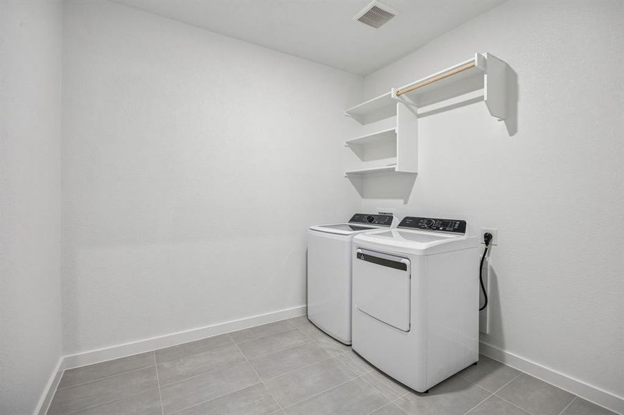 Utility Room in the Wimbledon home plan by Trophy Signature Homes – REPRESENTATIVE PHOTO Utility Room in the Wimbledon home plan by Trophy Signature Homes – REPRESENTATIVE PHOTO