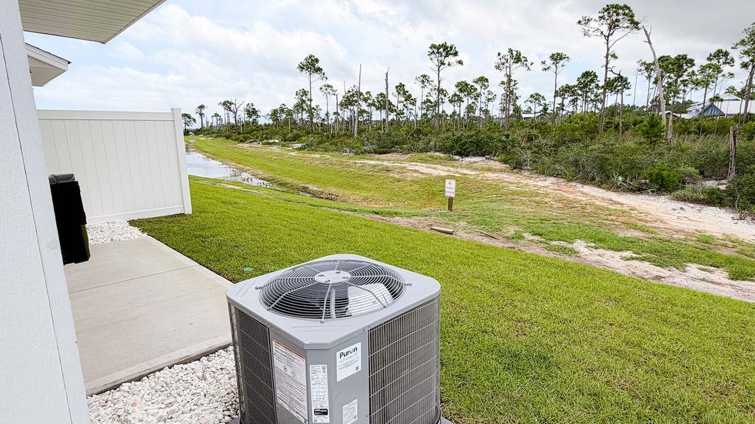 Exterior details and patio area of a home in WindMark Beach, Port Saint Joe (Image 28).