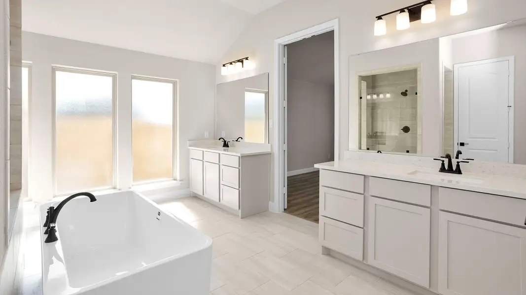 Furnished interior view inside a new home in Grand Central Park 50', Conroe (Image 4).