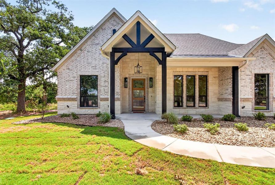 Front exterior of a new home in , Azle, TX, highlighting curb appeal (Image 2). Front exterior of a new home in , Azle, TX, highlighting curb appeal (Image 2).