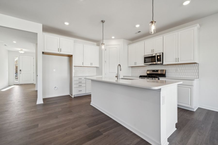 Representative furnished interior of a home built from the Madison Premier by Taylor Morrison in Stafford at Langtree, Mooresville (Image 14).