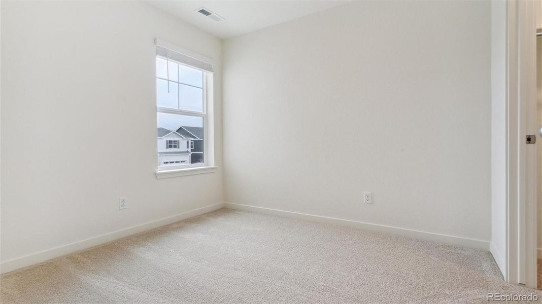 Spacious, unfurnished interior of a new home in Silver Peaks, Lochbuie (Image 21).