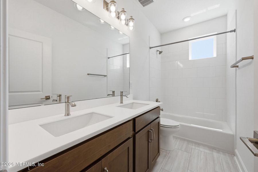 Furnished interior view inside a new home in Crosswinds 40’, Ponte Vedra (Image 9).
