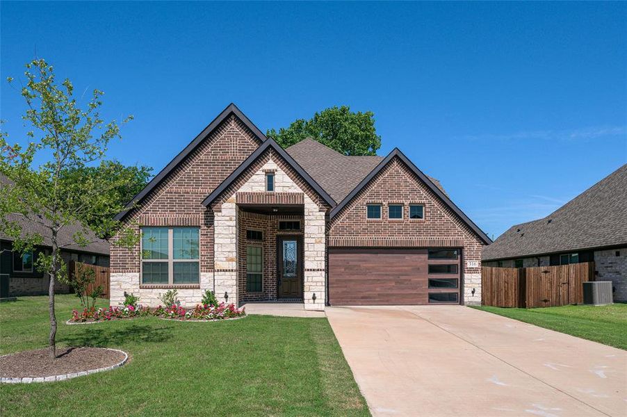 Front exterior of a new home in , Josephine, TX, highlighting curb appeal (Image 2). Front exterior of a new home in , Josephine, TX, highlighting curb appeal (Image 2).