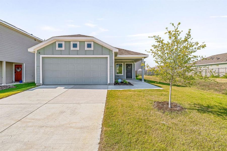 Front exterior of a new home in South Oak Grove: Cottage Collection, Fort Worth, TX, highlighting curb appeal (Image 19). Front exterior of a new home in South Oak Grove: Cottage Collection, Fort Worth, TX, highlighting curb appeal (Image 19).