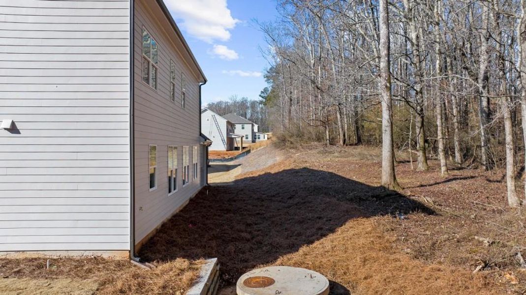 Front exterior of a new home in , Canton, GA, highlighting curb appeal (Image 23).