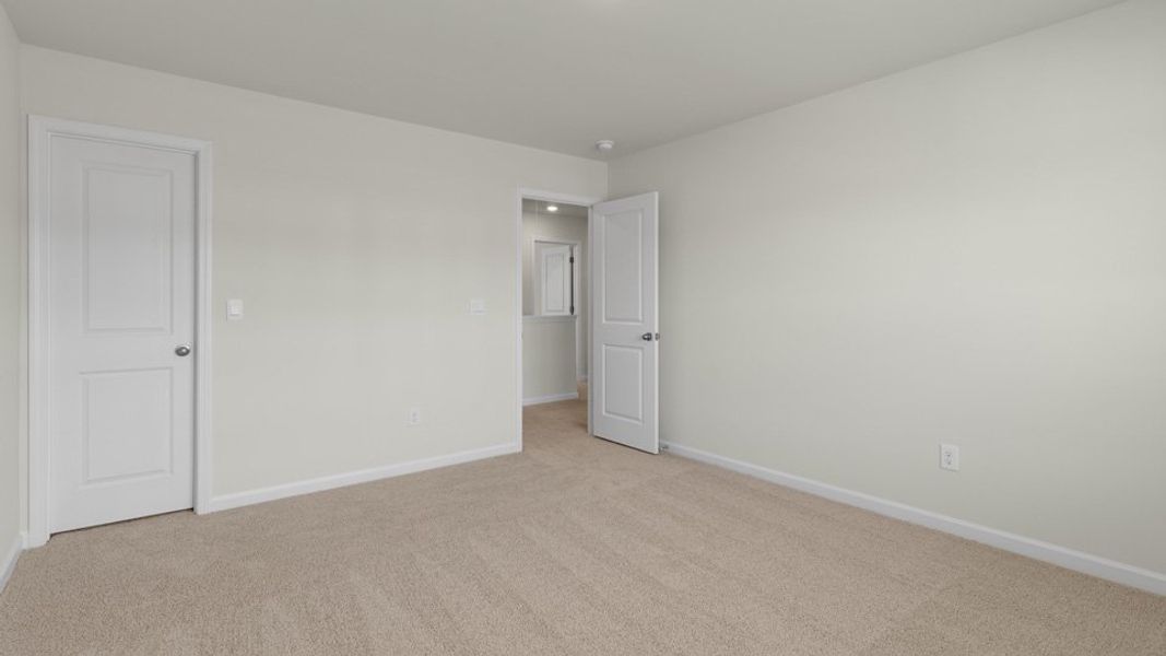 Spacious, unfurnished interior of a new home in The Reserve at Stoney Creek, Whitsett (Image 27).