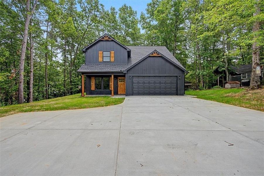 Front exterior of a new home in , Emerson, GA, highlighting curb appeal (Image 15).