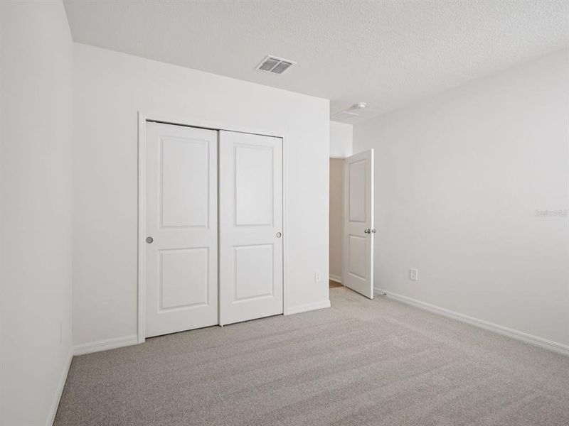 Spacious, unfurnished interior of a new home in The Grove at Stuart Crossing - Classic Series, Bartow (Image 30). Spacious, unfurnished interior of a new home in The Grove at Stuart Crossing - Classic Series, Bartow (Image 30).