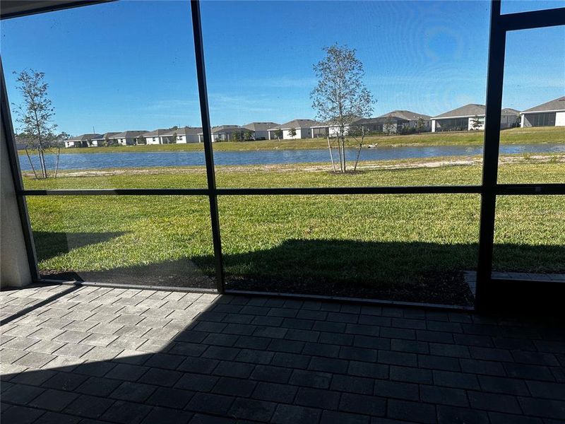Exterior details and patio area of a home in Island Lakes at Coco Bay: Executive Homes, Englewood (Image 4). Exterior details and patio area of a home in Island Lakes at Coco Bay: Executive Homes, Englewood (Image 4).