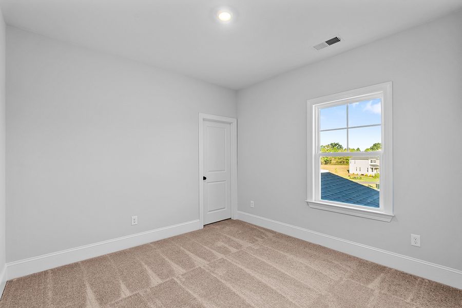 Spacious, unfurnished interior of a new home in Lilah Grove, Summerfield (Image 37).