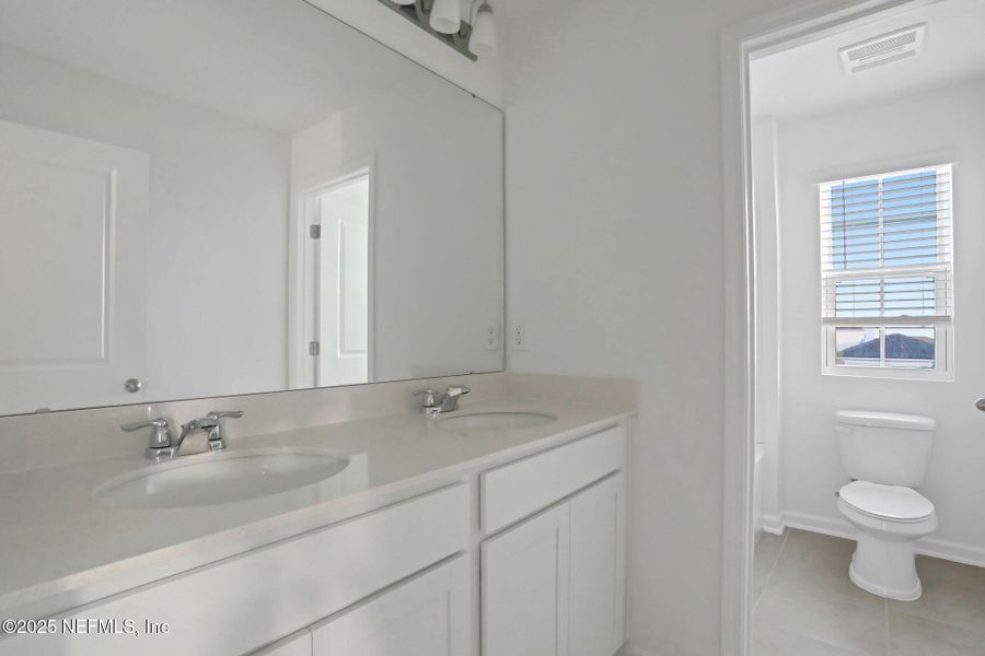 Furnished interior view inside a new home in Cordova Palms, St. Augustine (Image 10).