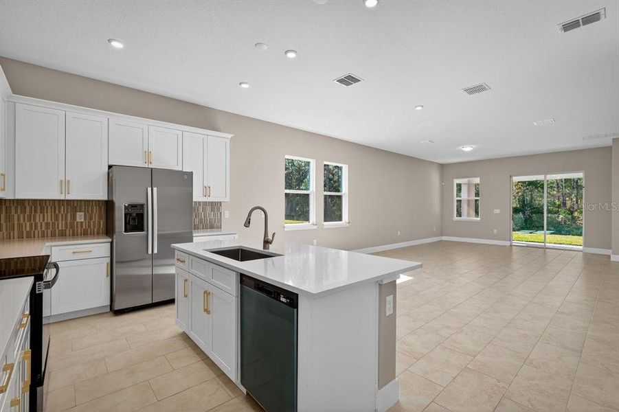 Furnished interior view inside a new home in Gray Hawk at Hole Two, Daytona Beach (Image 21).