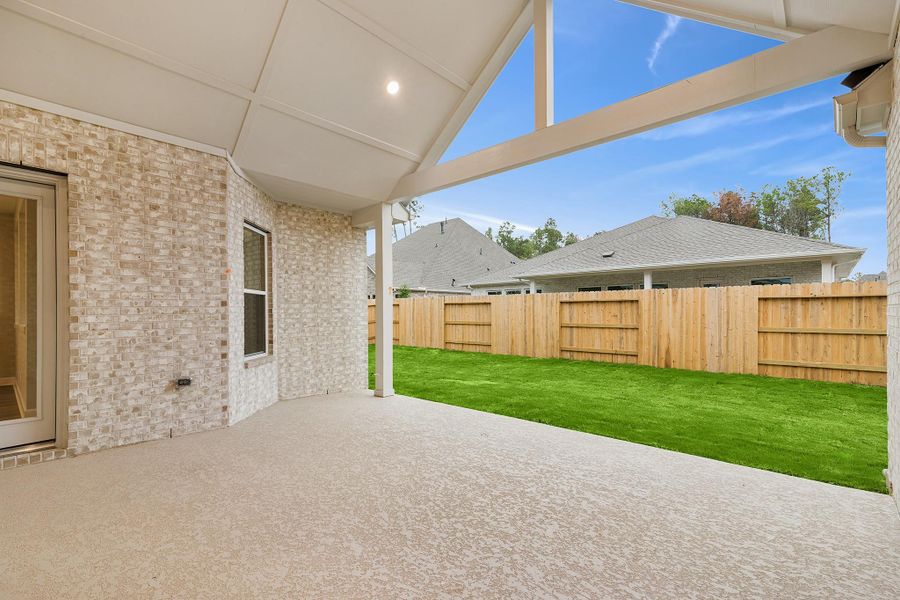 Exterior details and patio area of a home in ARTAVIA 65' Homesites, Conroe (Image 27).