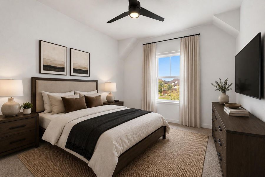 Another secondary bedroom featuring bright natural light, ceiling fan, plush carpet, and a spacious closet. *This photo has been virtually staged.