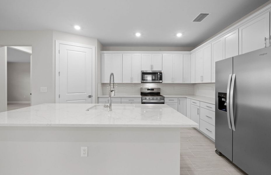Furnished interior view inside a new home in Del Webb Oak Creek, North Fort Myers (Image 12).