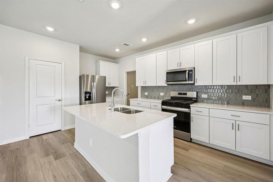 Furnished interior view inside a new home in Lakehaven - Spring Series, Farmersville (Image 5).